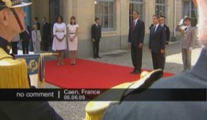 Les hymnes américains et français marquent l'arrivée d'Obama