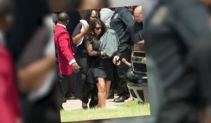 Kim Kardashian, Kanye West et bébé North West assistent à des funérailles