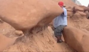 Un gros débile détruit une formation rocheuse (Goblin Valley)!