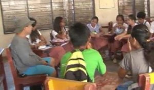 Typhon aux Philippines: un collège rouvre ses portes malgré les dégâts - 19/11