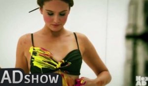 Hot woman does body painting