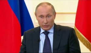 Poutine dénonce "un coup d'état" en Ukraine