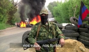 En Ukraine, le bastion rebelle de Sloviansk attend l'armée