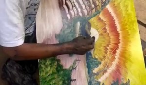 En moins de 10 minutes, cet homme va réaliser une peinture magnifique avec ses mains !