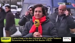 Gestes surréalistes derrière une journaliste lors de la prise d'otage à Vincennes