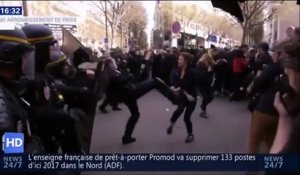 Un CRS met un violent coup de pied à une manifestante à paris