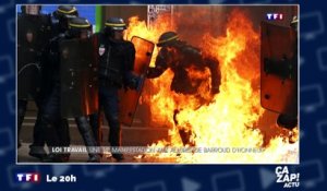 Un CRS en feu pendant la manifestation contre la loi Travail