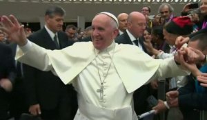 Pope prays with poor