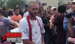 Un homme avec des croix gammées sur son pull se fait taper à une manifestation