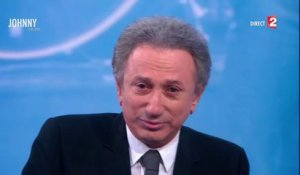 Michel Drucker ému aux larmes à la fin de l'émission hommage à Johnny Hallyday.