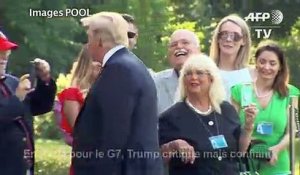 Trump en route pour le G7, critique mais confiant