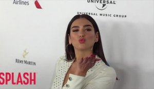 Dua Lipa bursts into tears after cutting show short due to ear infection
