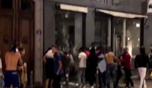 Looters Ransack Sports Shop in Lyon After France World Cup Victory
