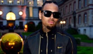Chris Brown In Custody in Paris Due to Rape Complaint | Billboard News
