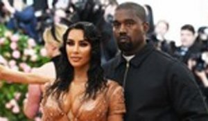 Kim Kardashian and Kanye West Welcome Fourth Child | Billboard News