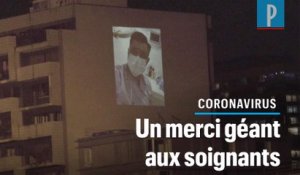Paris : des photos de soignants projetées en grand sur une façade d'immeuble