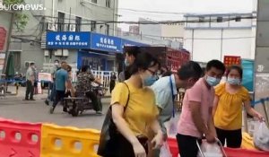 Coronavirus : un nouveau foyer détecté autour d'un marché de Pékin, plusieurs quartiers confinés