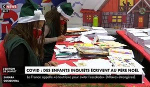 Reportage au service du courrier du Père Noël de la Poste avec des lettres d'enfants inquiets par la propagation du virus et le confinement