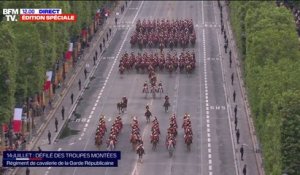 14-Juillet: le régiment de cavalerie de la Garde républicaine ferme le défilé sur les Champs-Élysées