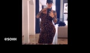 Amber Rose Shows Off Baby Bump