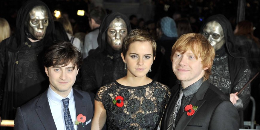 Daniel Radcliffe, Emma Watson et Rupert Grint lors de la première mondiale de 
